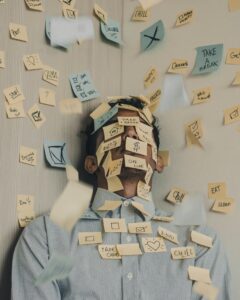 person covered in post it notes